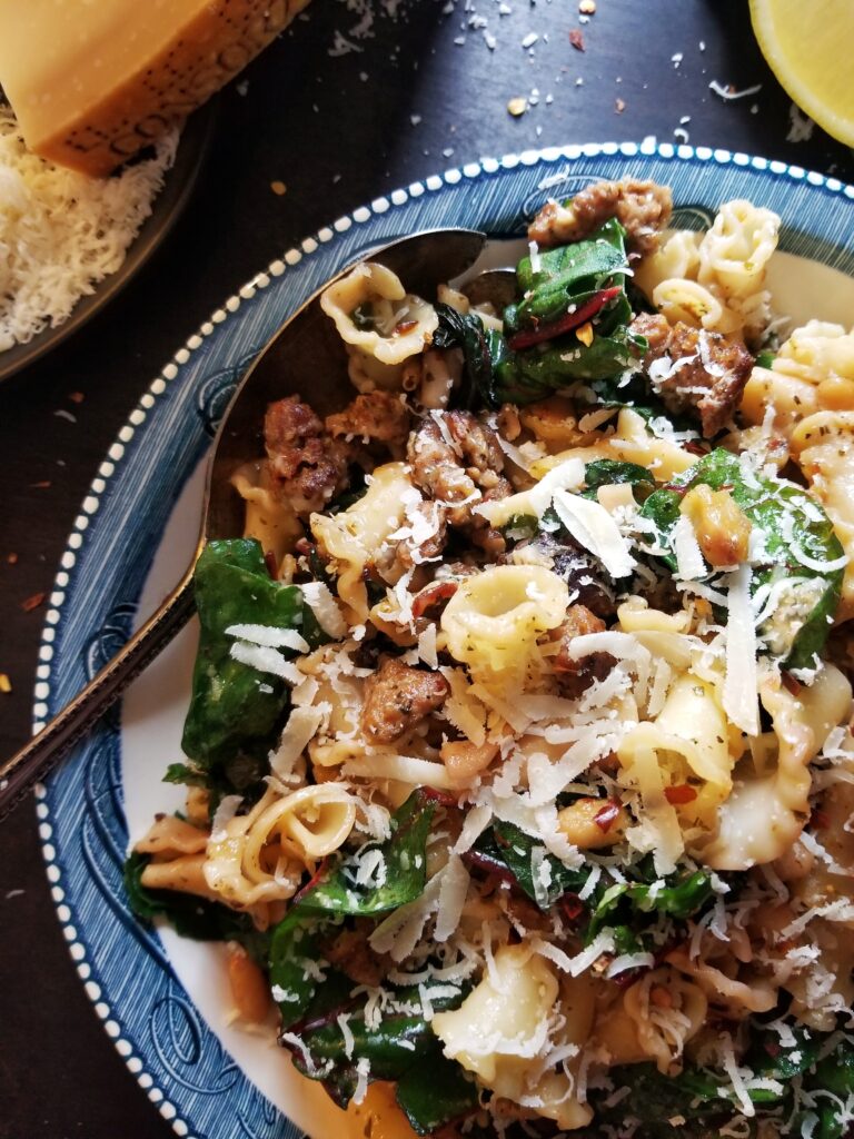 easy-skillet-pasta-with-sausage-swiss-chard-and-white-beans-recipe.jpg