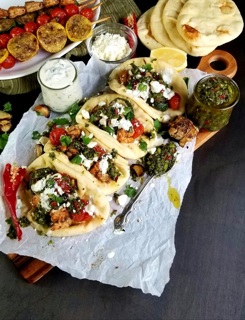 grilled-shrimp-and-veggie-flatbreads-with-roasted-garlic-chimichurri-and-cucumber-mint-yoghurt-sauce