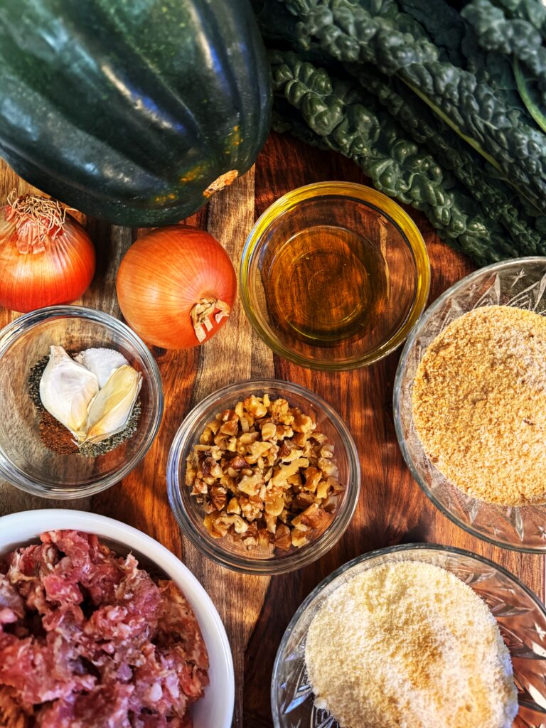 recipe for acorn squash stuffed with sausage, kale, and walnuts